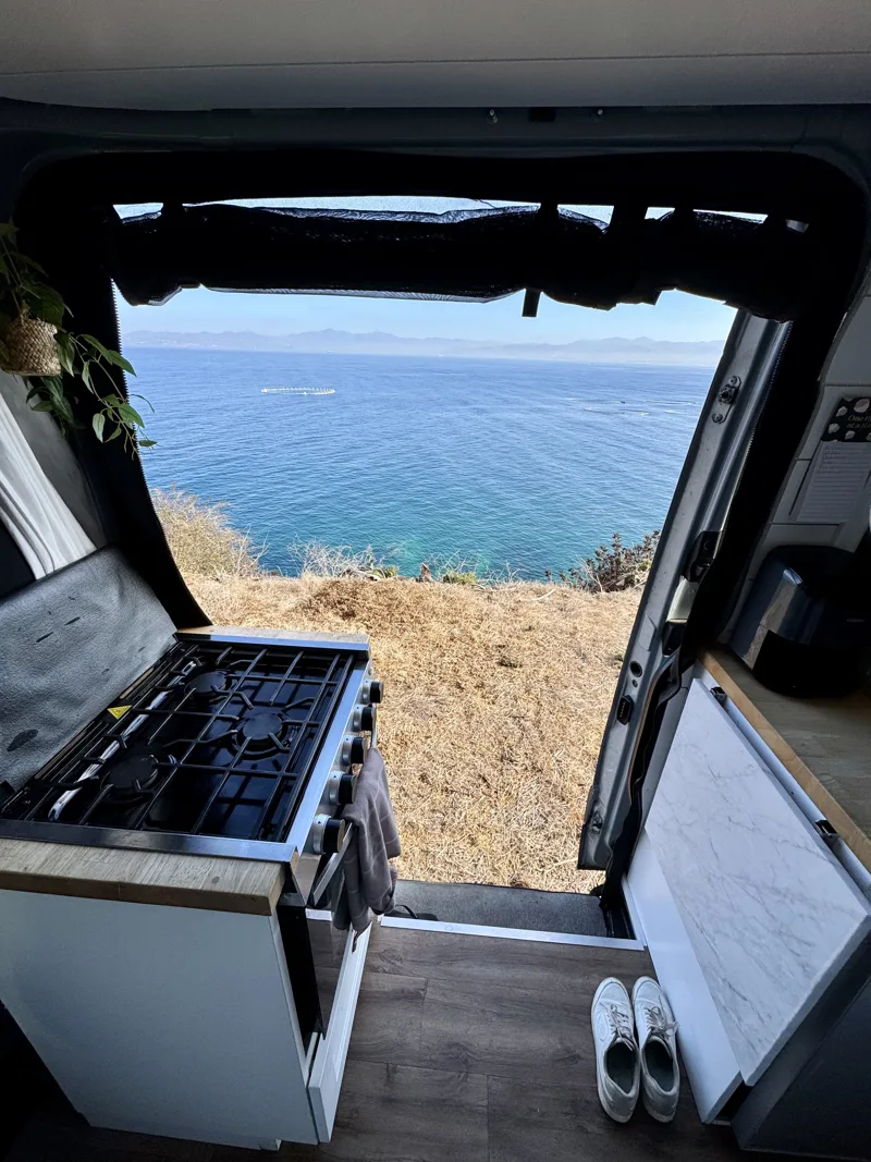 Ocean view through the open kitchen doorway