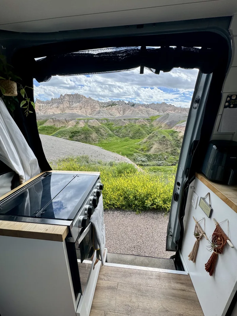 Green valley and mountains seen past the oven