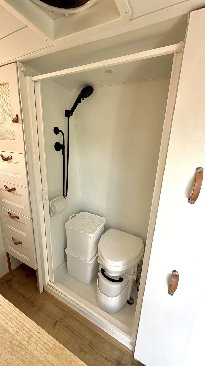 Open wet bath with shower and composting toilet