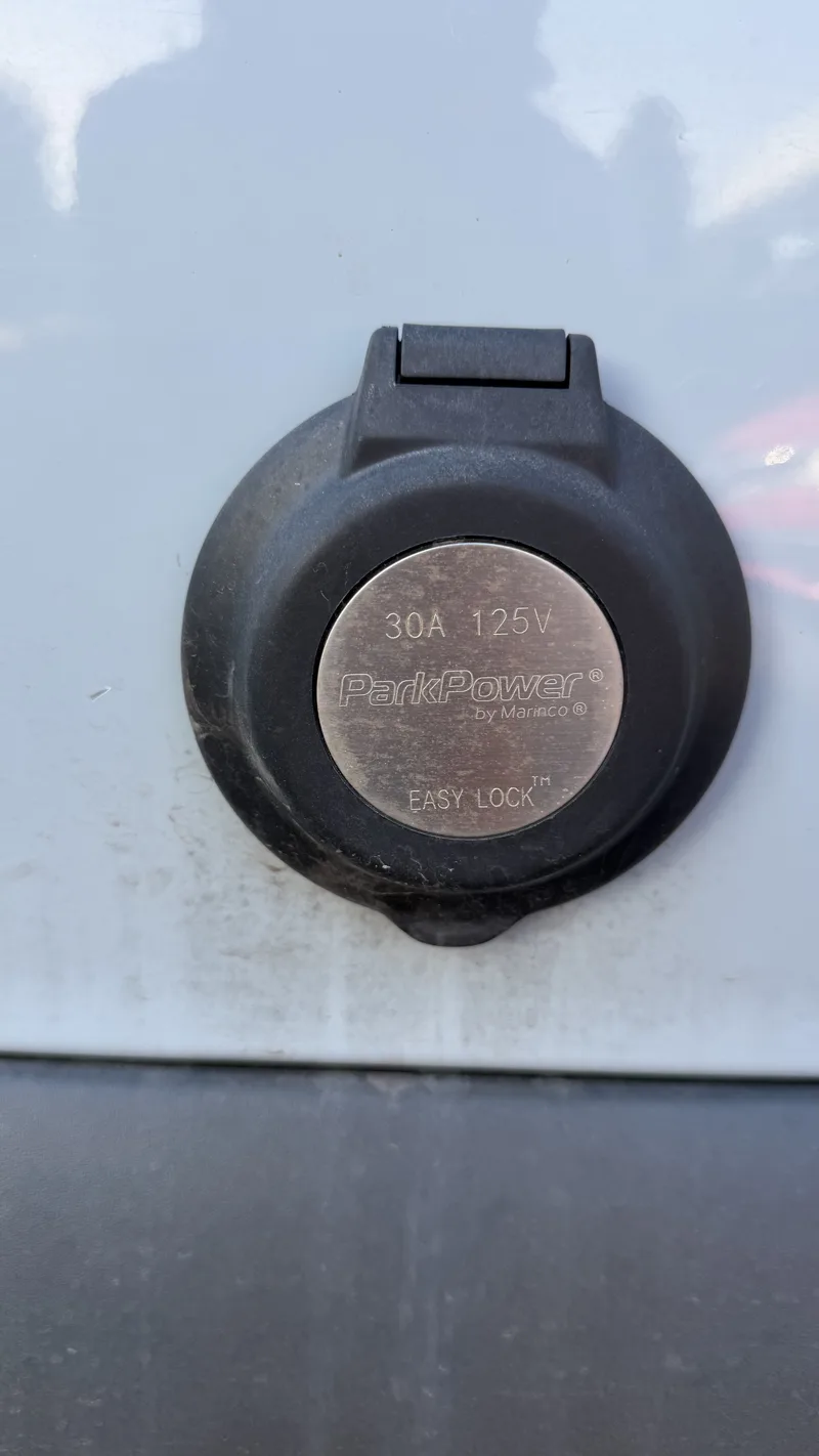 Exterior shore power connection with its cover open