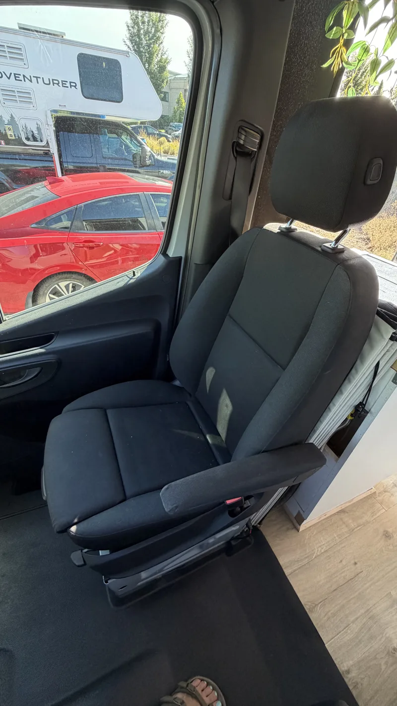 Passenger seat viewed from inside the van