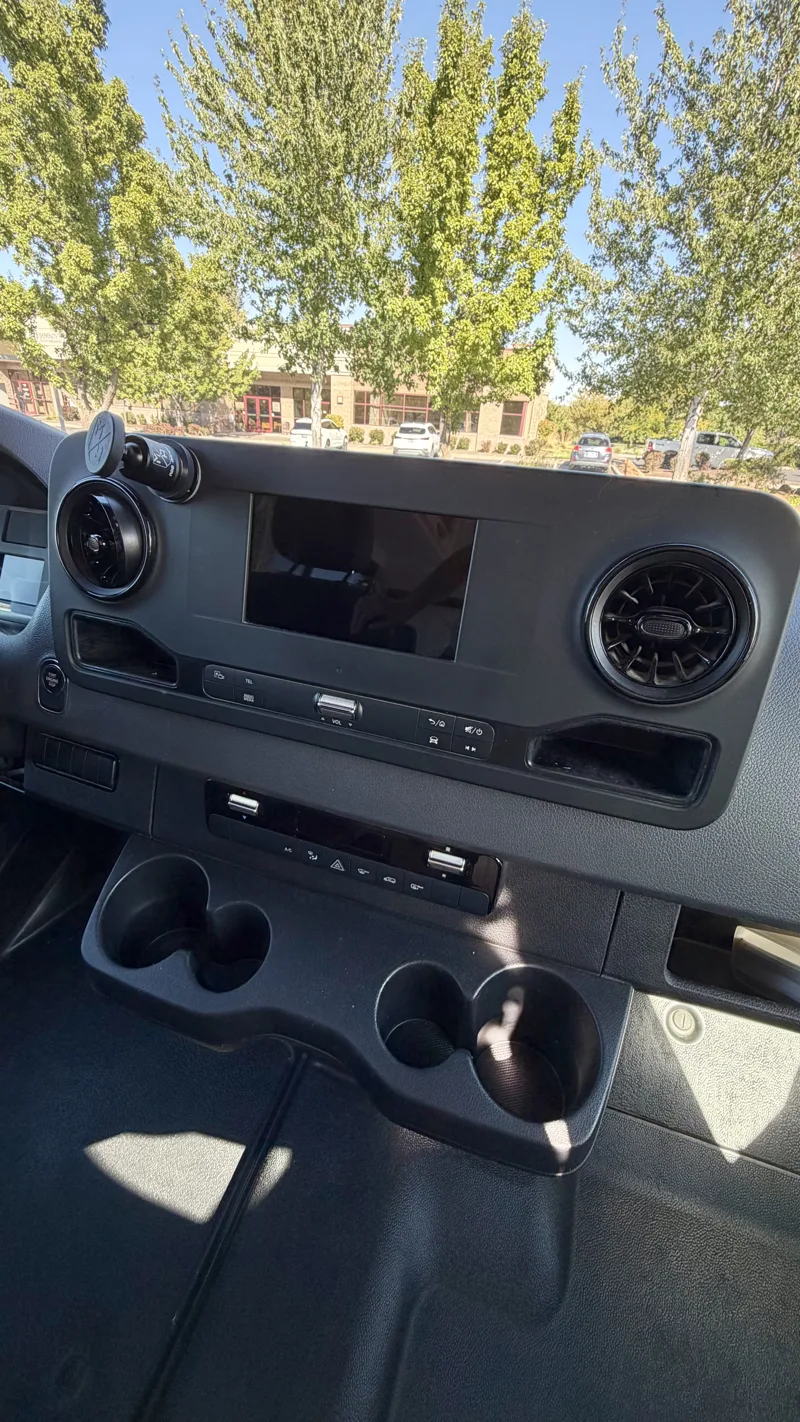 Dashboard screen, vents, and climate controls