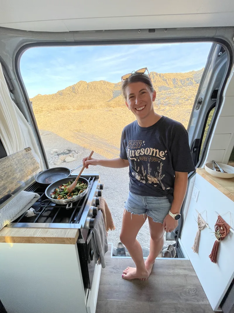 Steph preparing a meal in Pebbles’ kitchen