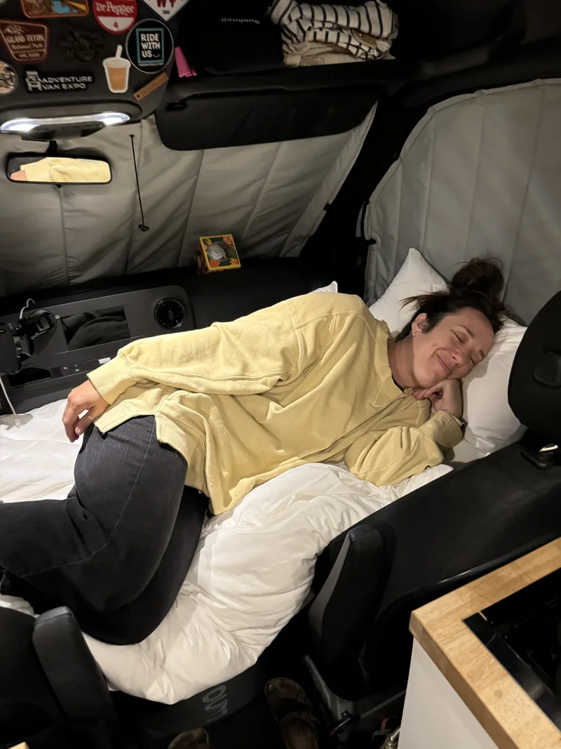 Relaxing on the Luno mattress across the cab seats