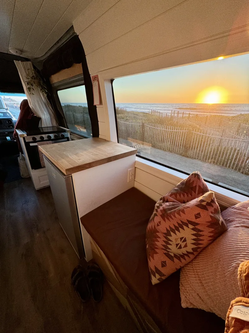 Bench seating and dining table in warm sunset light